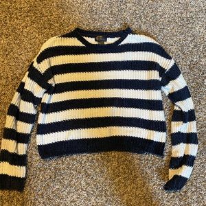 Blue and white striped cropped sweater.